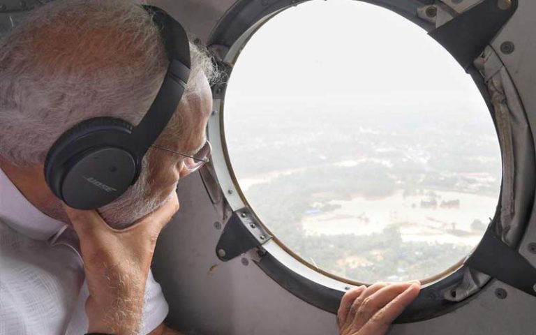 Narendra Modi seeingf flood affected areas, in Kerala