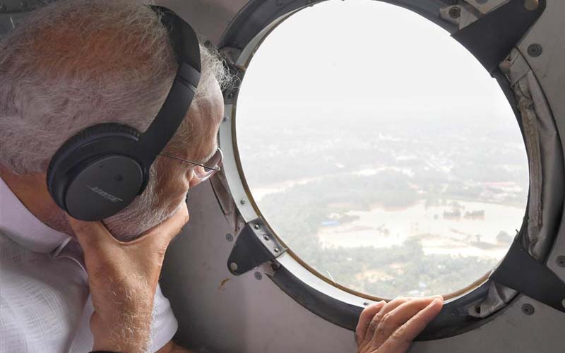 Narendra Modi seeingf flood affected areas, in Kerala